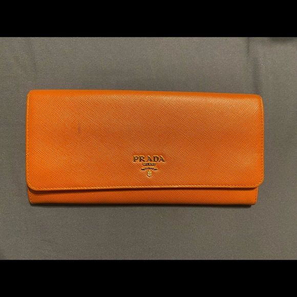 Prada Handbags - Prada saffiano lux leather continental wallet